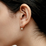 White Pearl Swirl Studs in Gold