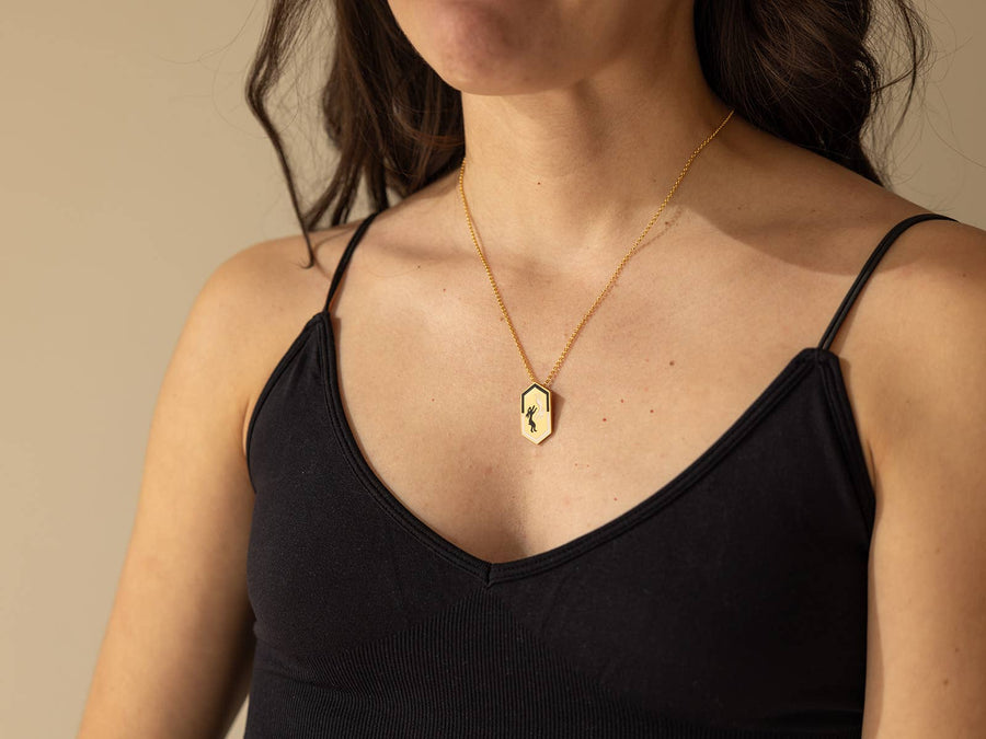 Chasing Tails Pendant Necklace in Gold: Gold Filled